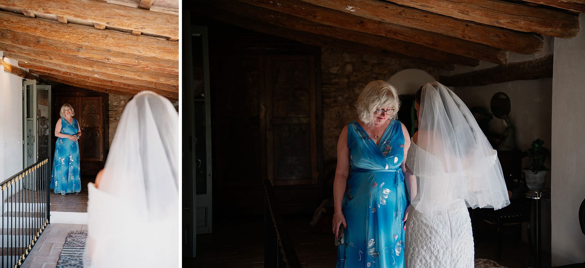 Bride in veil looks at mother in blue dress - Barcelona Wedding Photographer