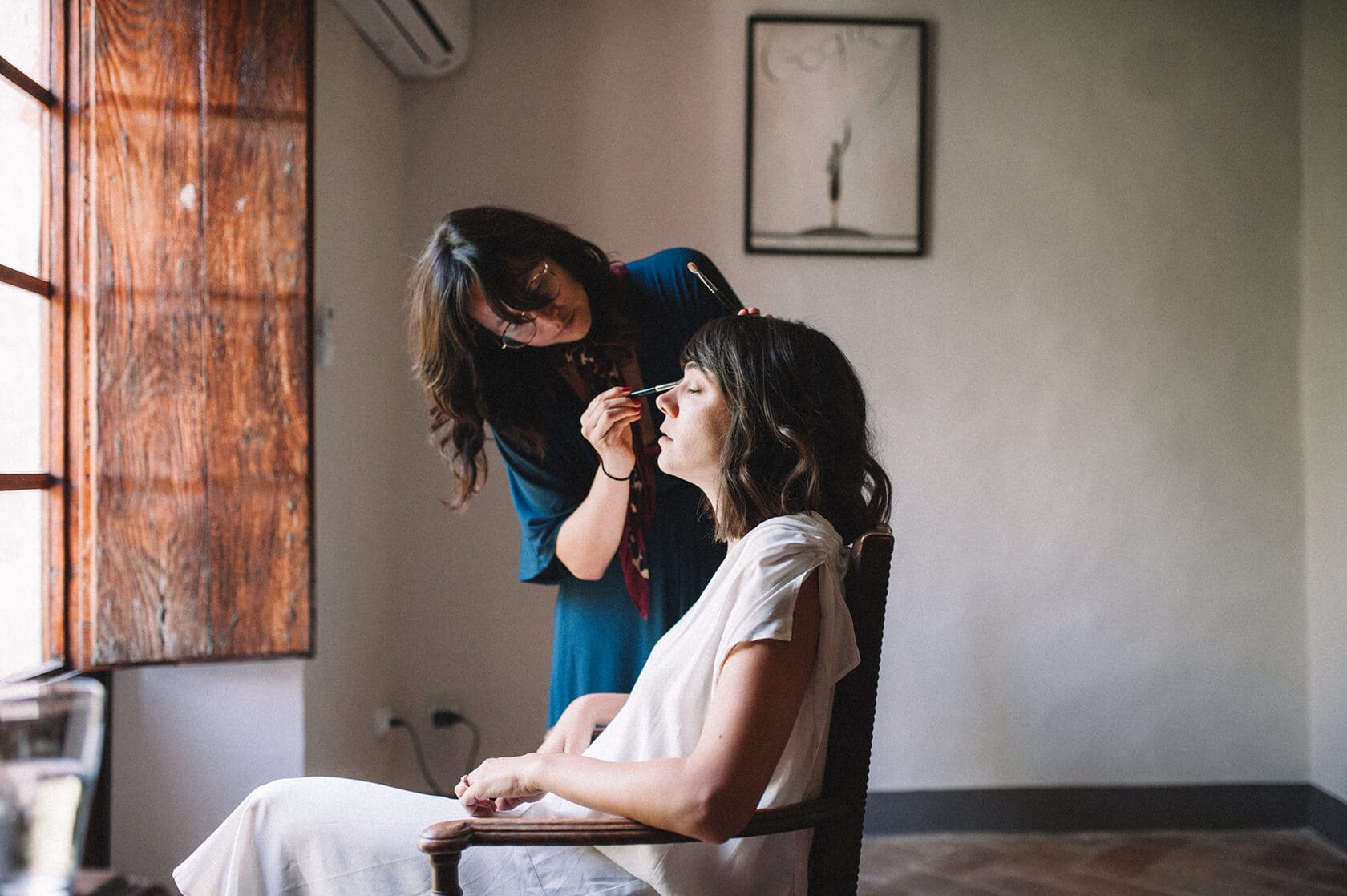 Bride getting makeup done at Villa Almanita for her destination wedding in Sitges. - Barcelona Wedding Photographer