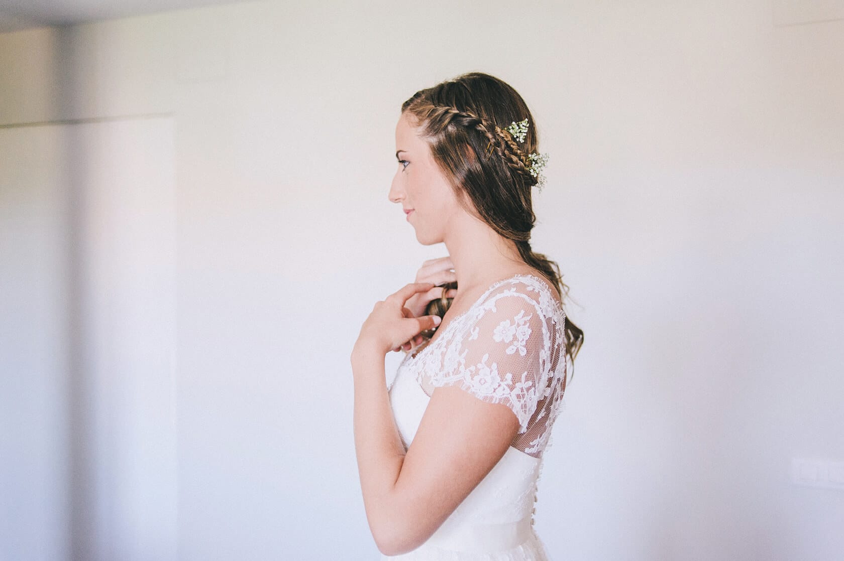 Bride with braided hair and floral accents, wedding photographer Barcelona - Barcelona Wedding Photographer