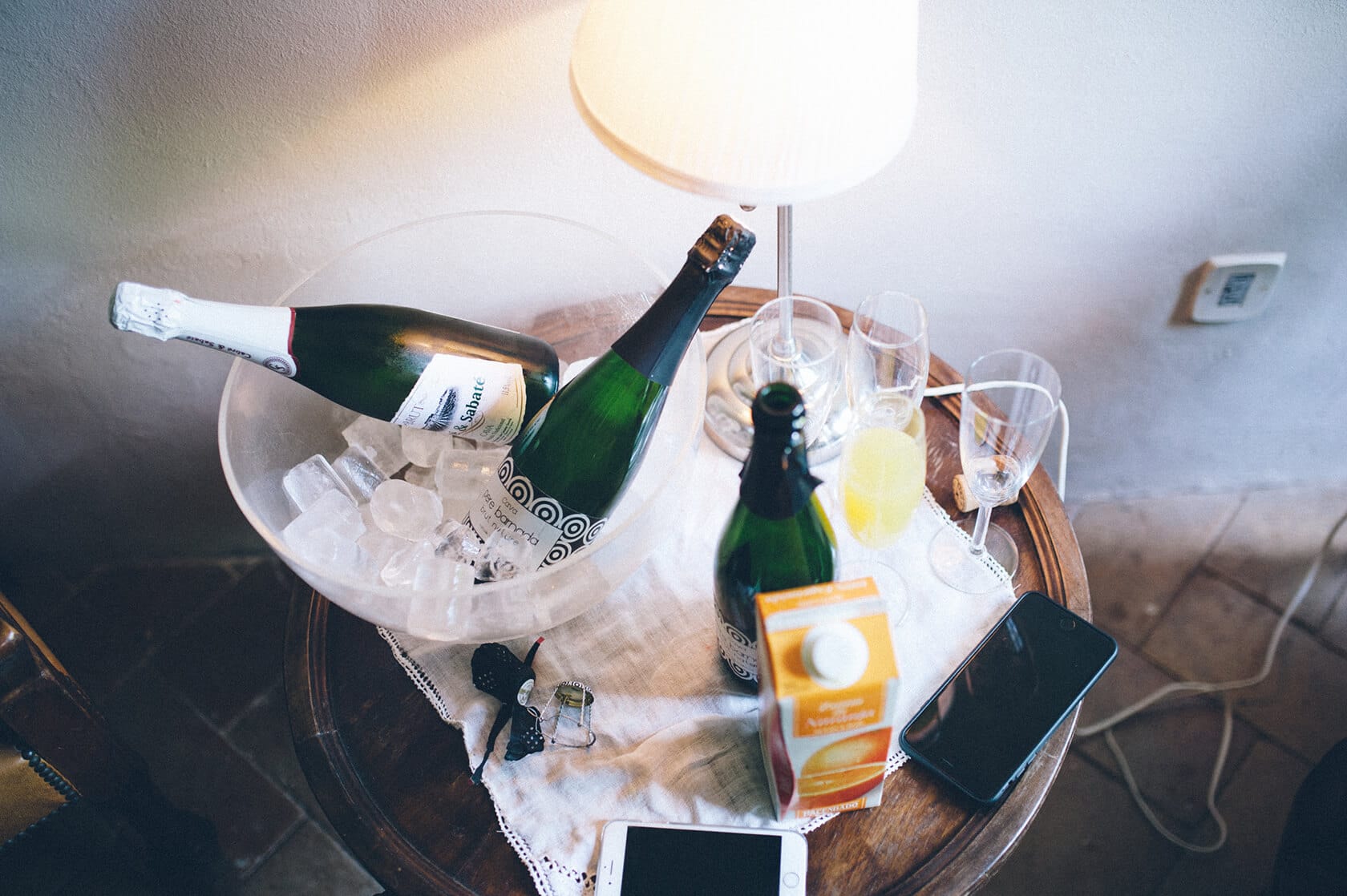 Champagne bottles chilling in ice at Villa Almanita, Sitges, for a destination wedding. - Barcelona Wedding Photographer