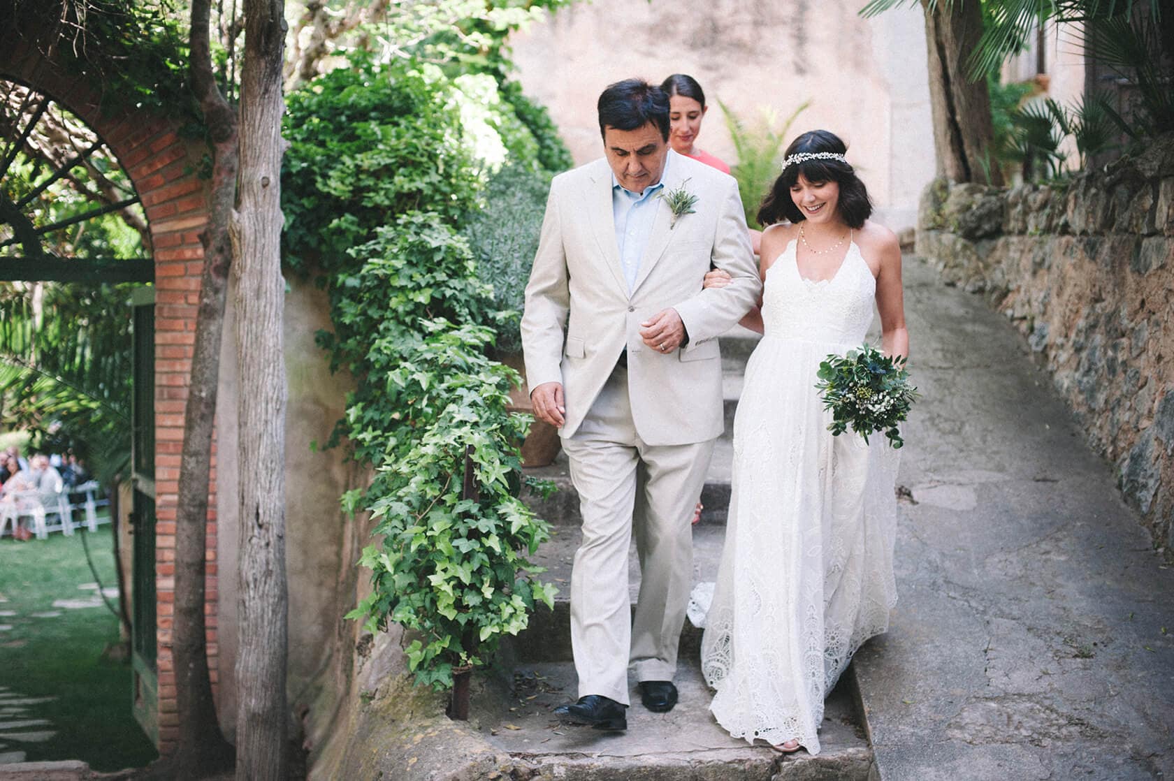 Bride and father walking down steps at Villa Almanita destination wedding in Sitges - Barcelona Wedding Photographer