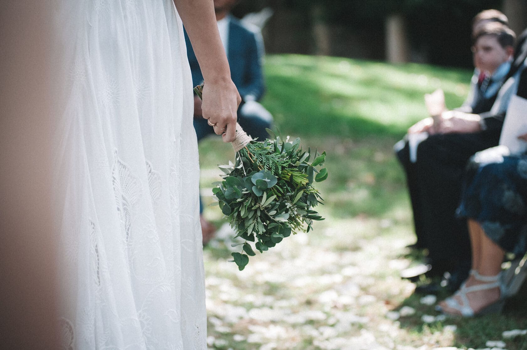 Bride holding a bouquet at a destination wedding villa in Sitges - Barcelona Wedding Photographer