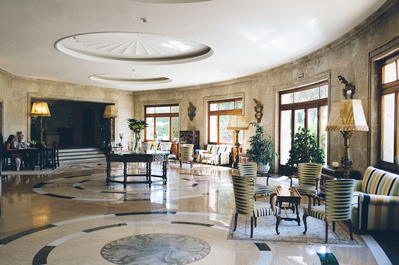 Elegant hotel lobby with ornate furniture and marble floors, S'Agaro Spain - Barcelona Wedding Photographer