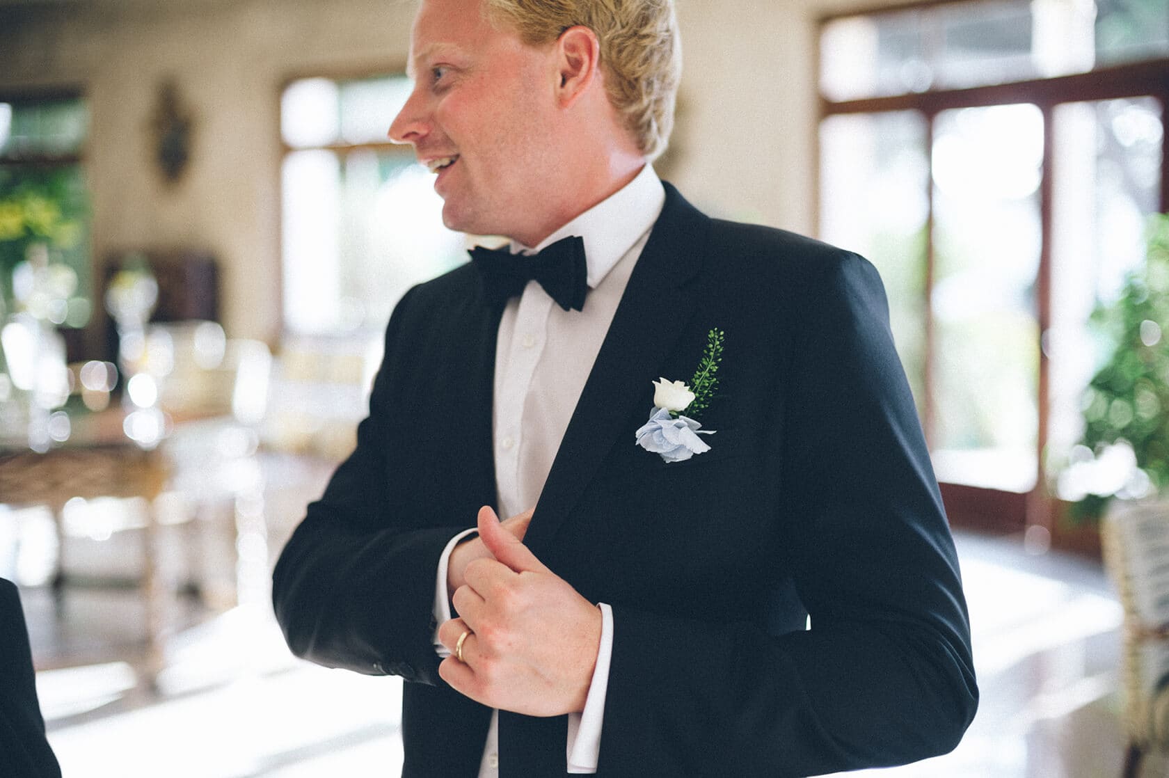 Groom in tuxedo with boutonniere, Tsega & Anders wedding, S'Agaro Spain - Barcelona Wedding Photographer