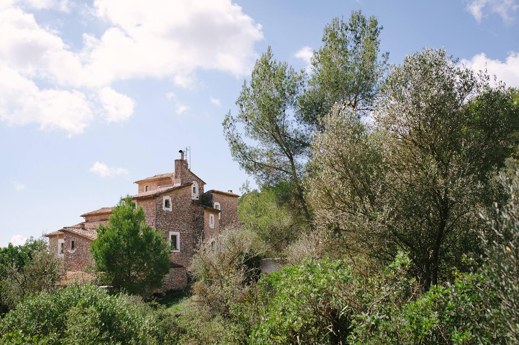 Stone building with trees, potential Barcelona wedding venue - Barcelona Wedding Photographer