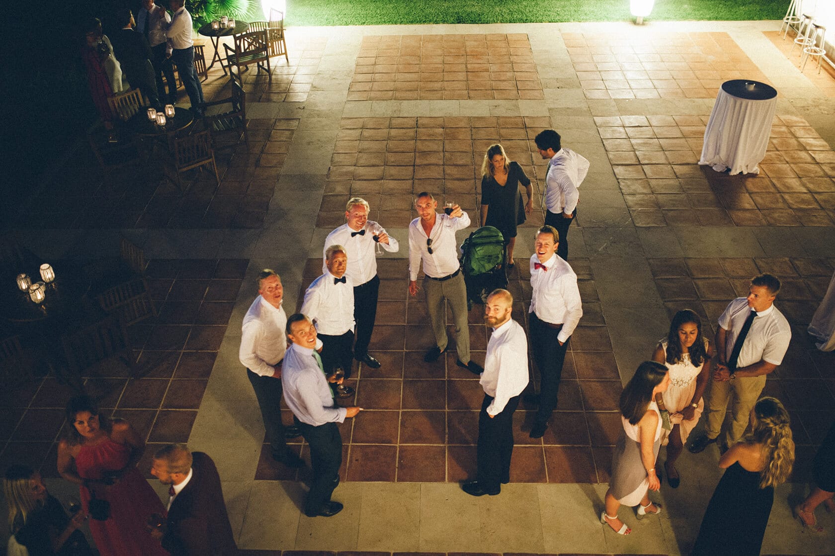 Wedding guests posing for a photo at Tsega & Anders' S'Agaro Spain wedding. - Barcelona Wedding Photographer