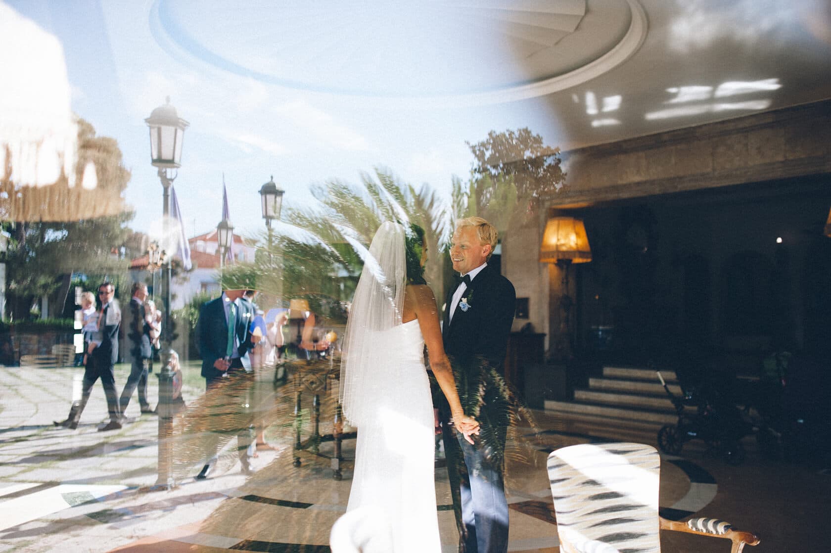 Newlyweds Tsega and Anders embrace at their wedding in S'Agaro, Spain. - Barcelona Wedding Photographer