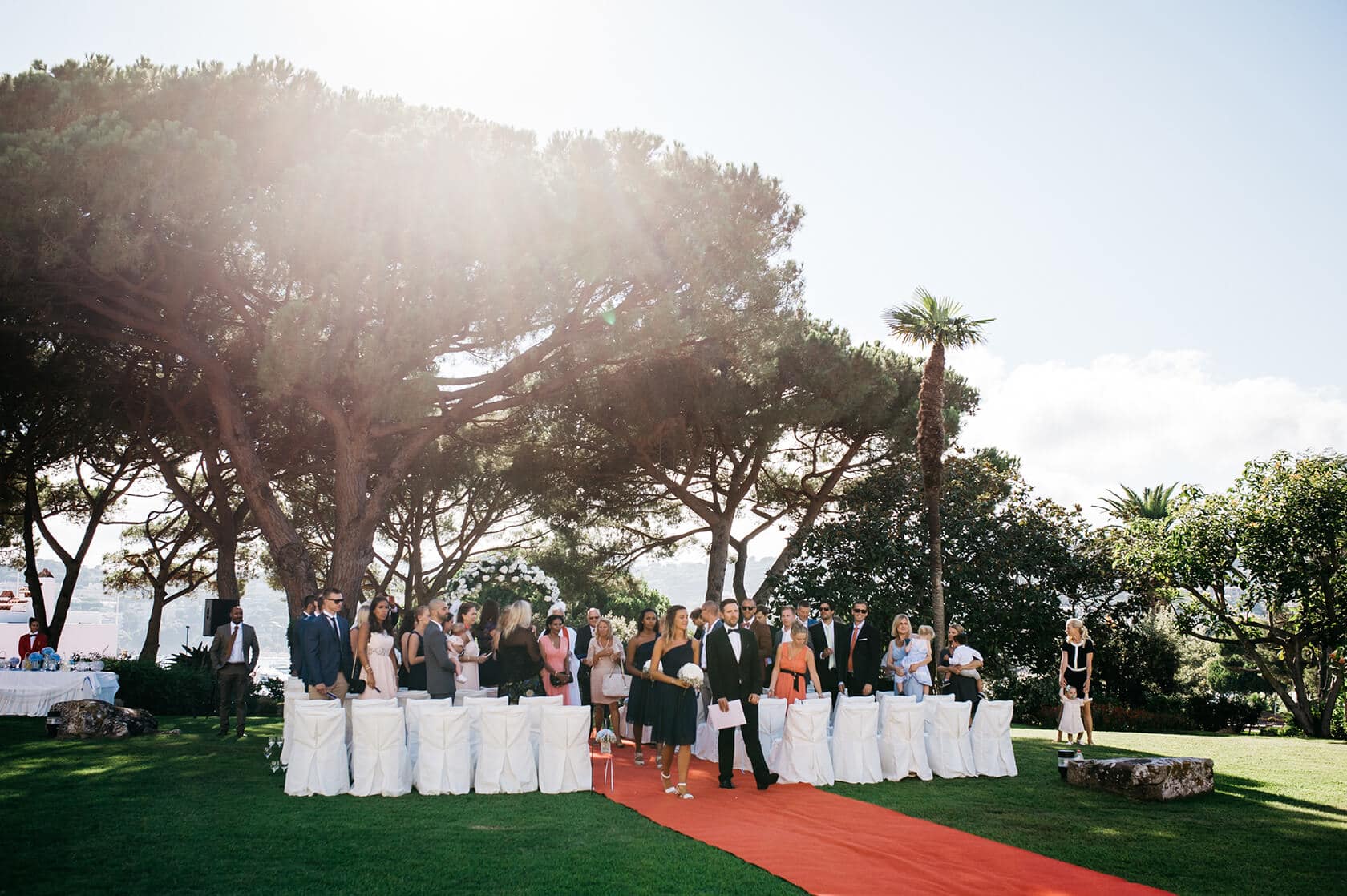 Tsega & Anders wedding ceremony in S'Agaro, Spain, with guests seated. - Barcelona Wedding Photographer
