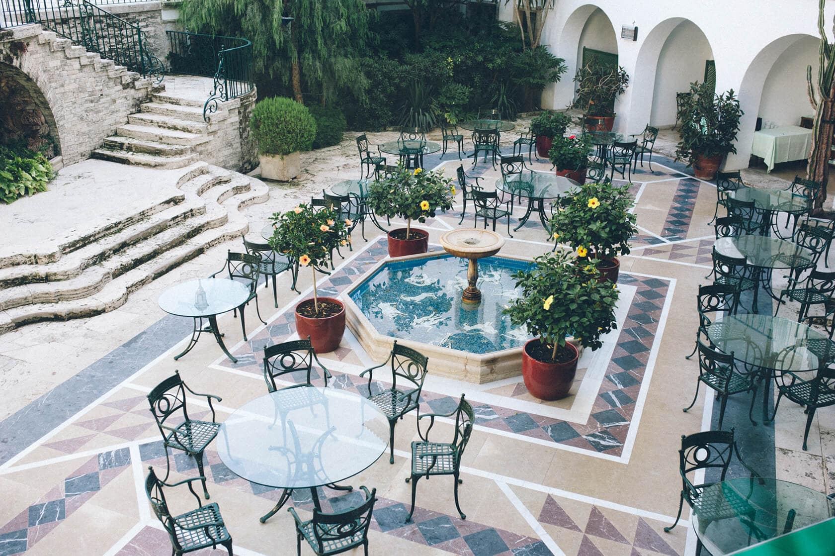 Outdoor courtyard wedding venue with fountain and seating, S'Agaro, Spain - Barcelona Wedding Photographer