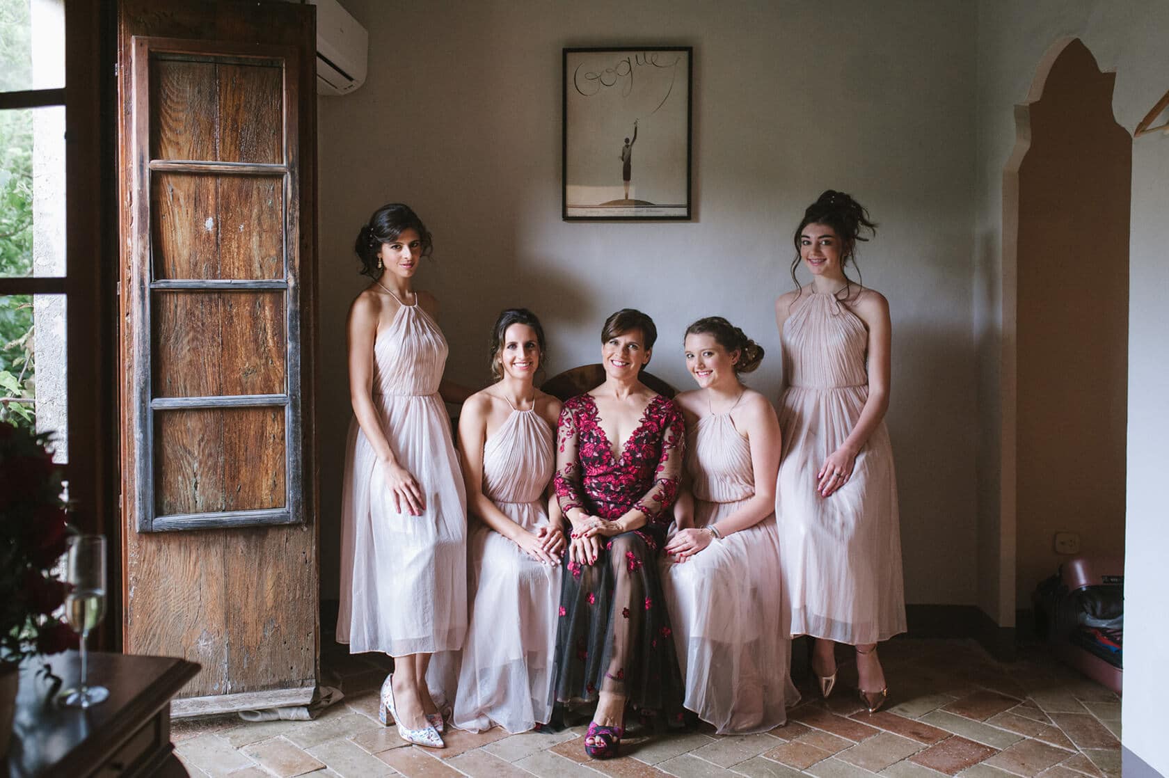 Bridesmaids in blush dresses posing at a wedding villa in Sitges - Barcelona Wedding Photographer