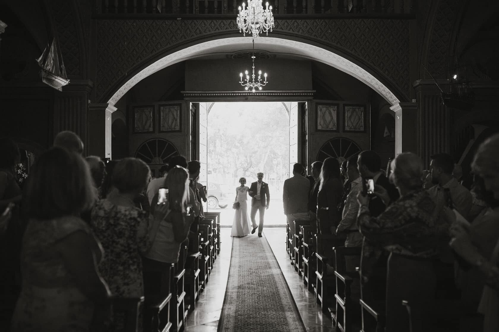 Bride and groom walking down aisle at Casanova Estate wedding venue. - Barcelona Wedding Photographer