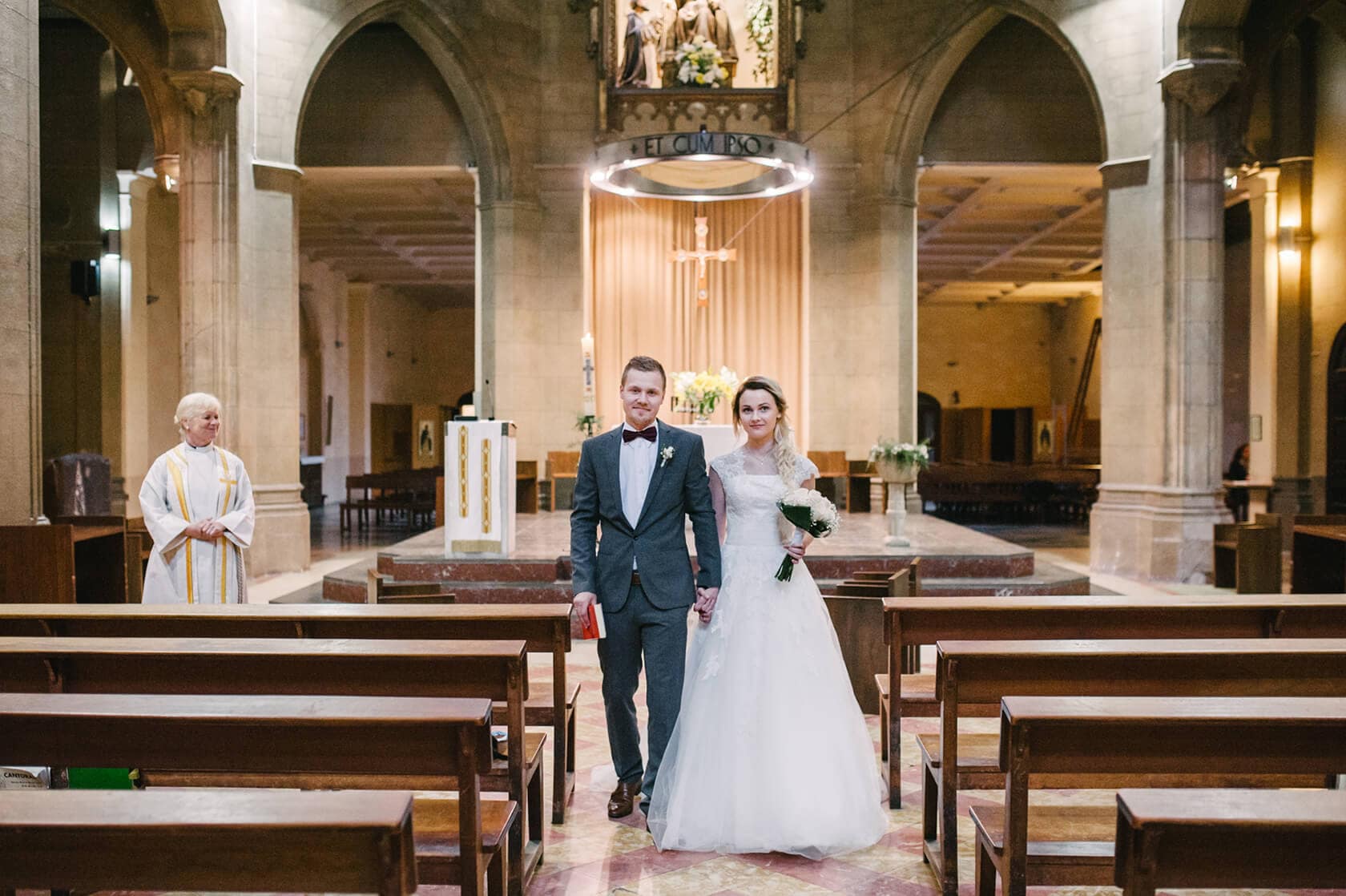 Bride and groom walking down church aisle, Barcelona wedding photographer - Barcelona Wedding Photographer