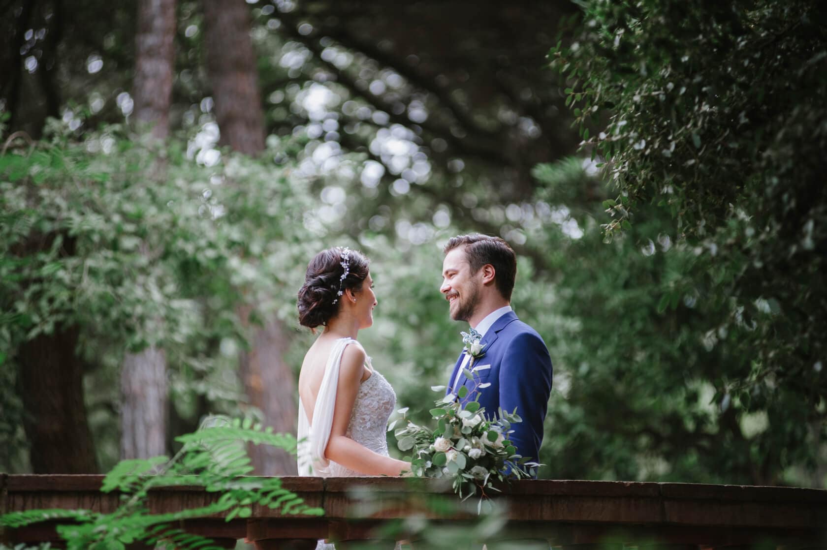 Wedding at Parc del Laberint d'Horta Wedding at Parc del Laberint d'Horta: Bride and groom smile at each other. - Barcelona Wedding Photographer