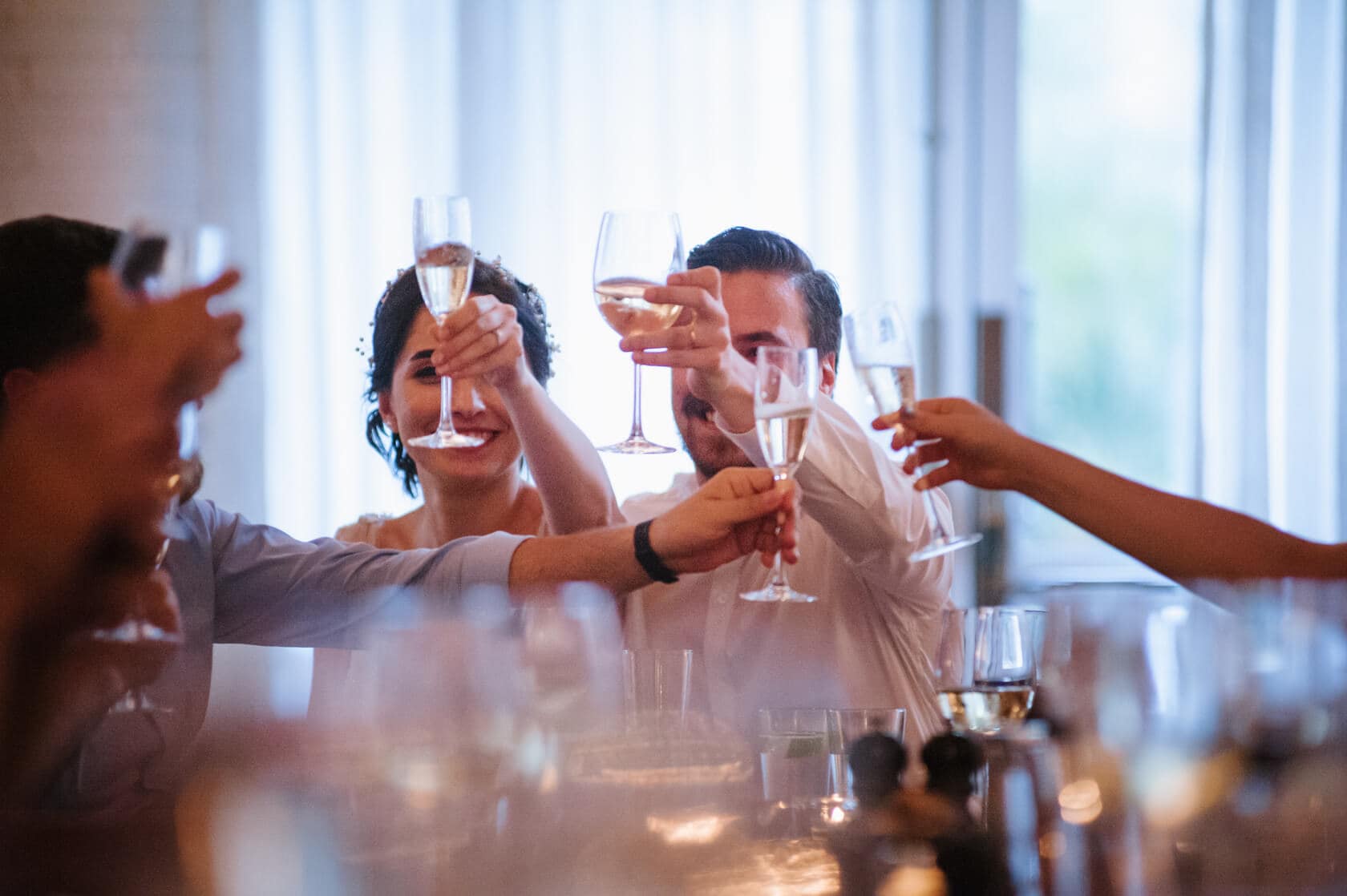 Wedding guests toasting with champagne at Parc del Laberint d'Horta - Barcelona Wedding Photographer
