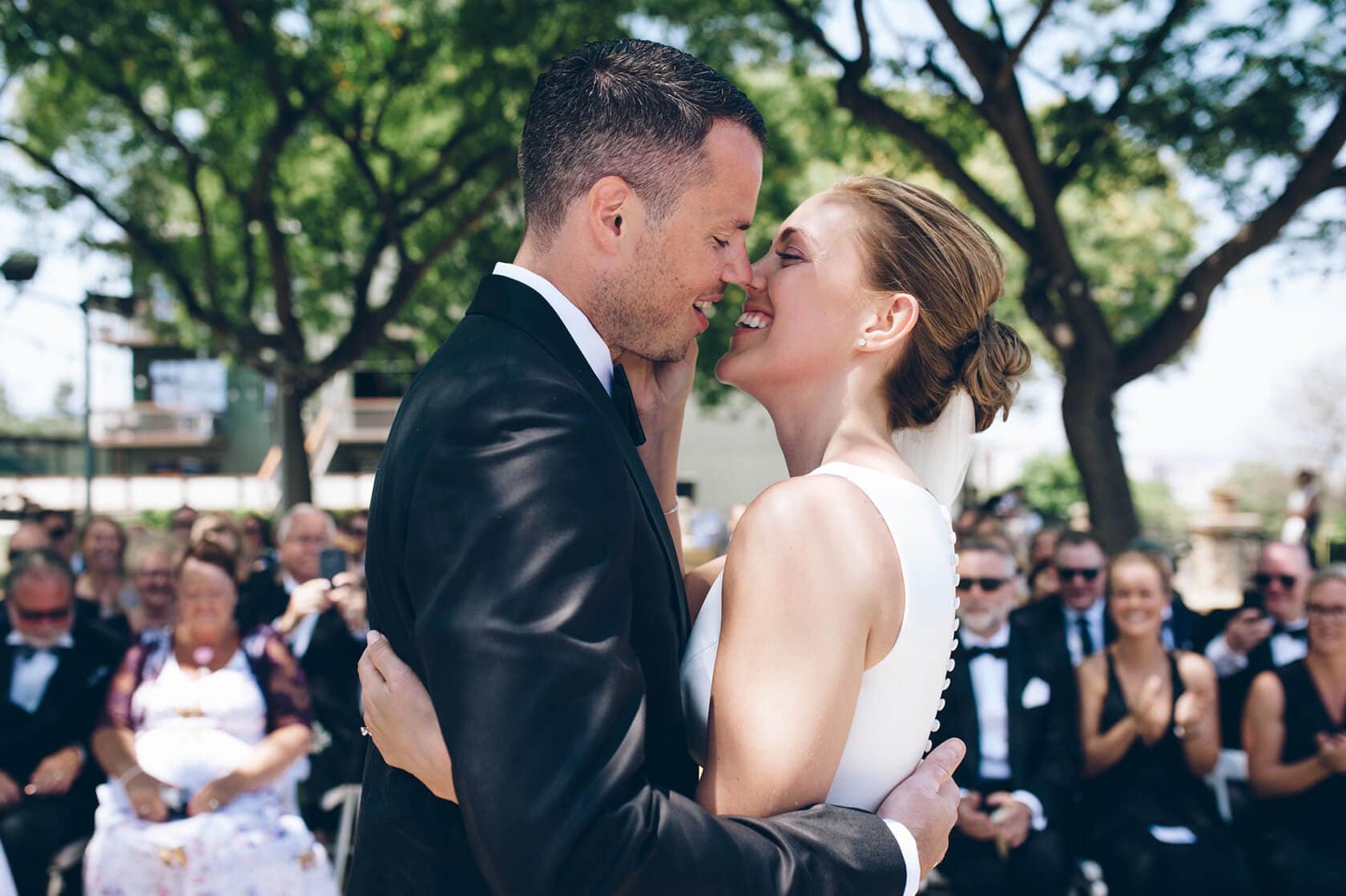 Trine & Torgeir wedding at Hotel Miramar Barcelona, happy couple embracing - Barcelona Wedding Photographer
