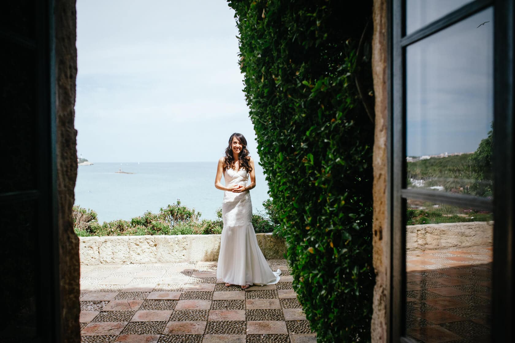 Bride in white dress at Castell de Tamarit wedding, Sitges, Spain - Barcelona Wedding Photographer