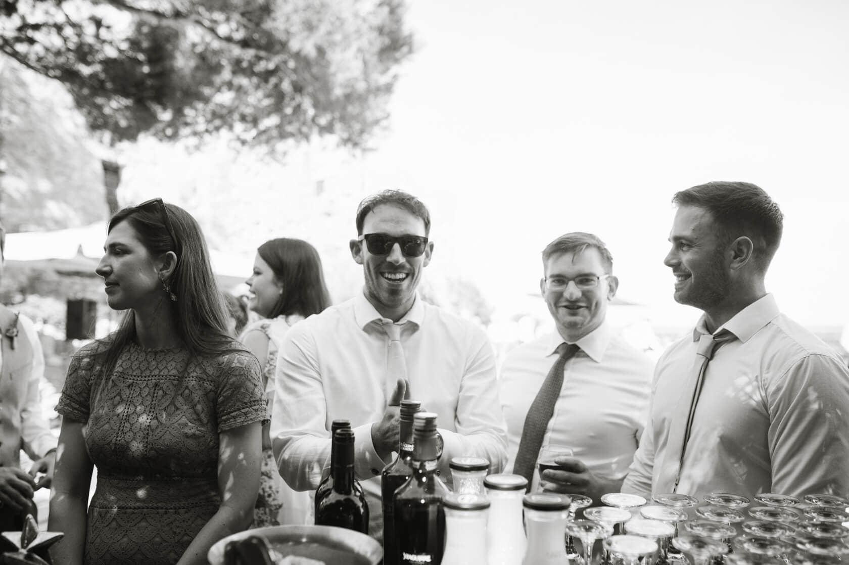 Sitges wedding at Castell de Tamarit: Groom and guests celebrate - Barcelona Wedding Photographer