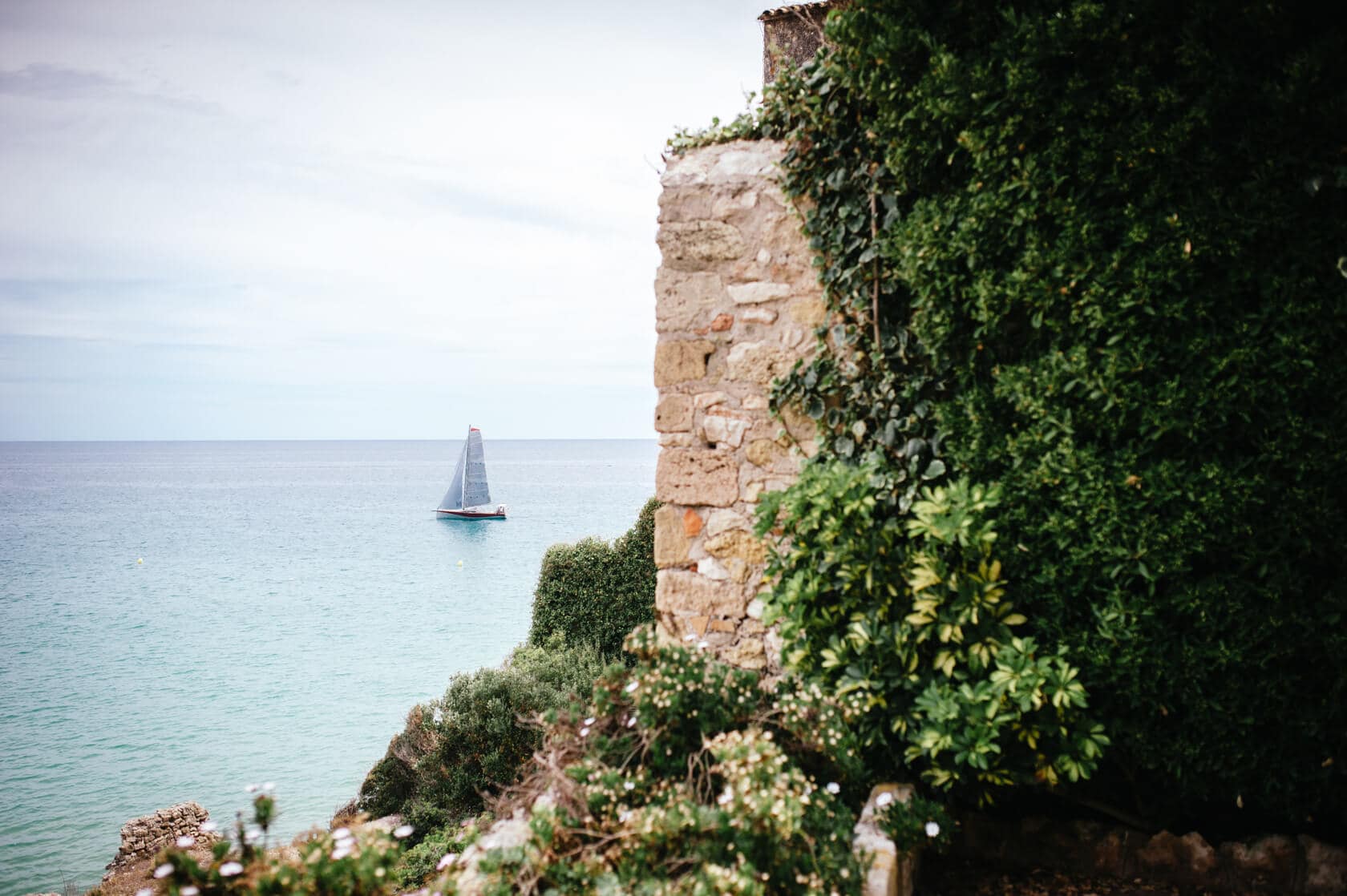 Sailboat near Castell de Tamarit, Sitges wedding photography - Barcelona Wedding Photographer
