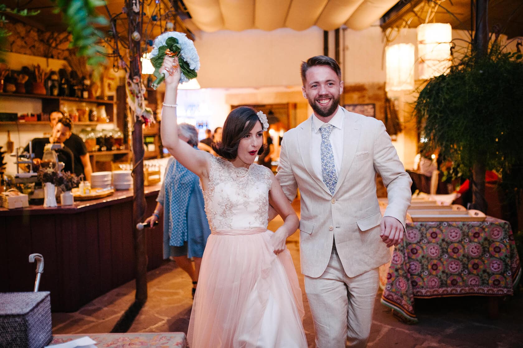 Bride and groom entering wedding celebration, vintage style wedding - Barcelona Wedding Photographer