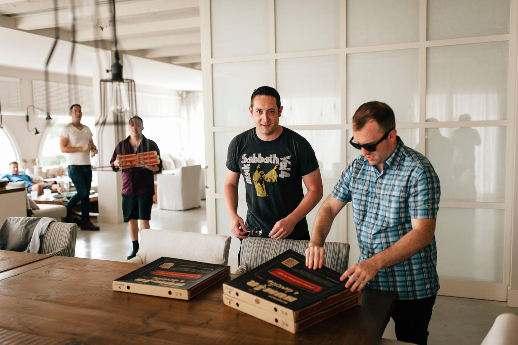 Pizza at Alexandra & Cooper's wedding in Masia Casa del Mar - Barcelona Wedding Photographer