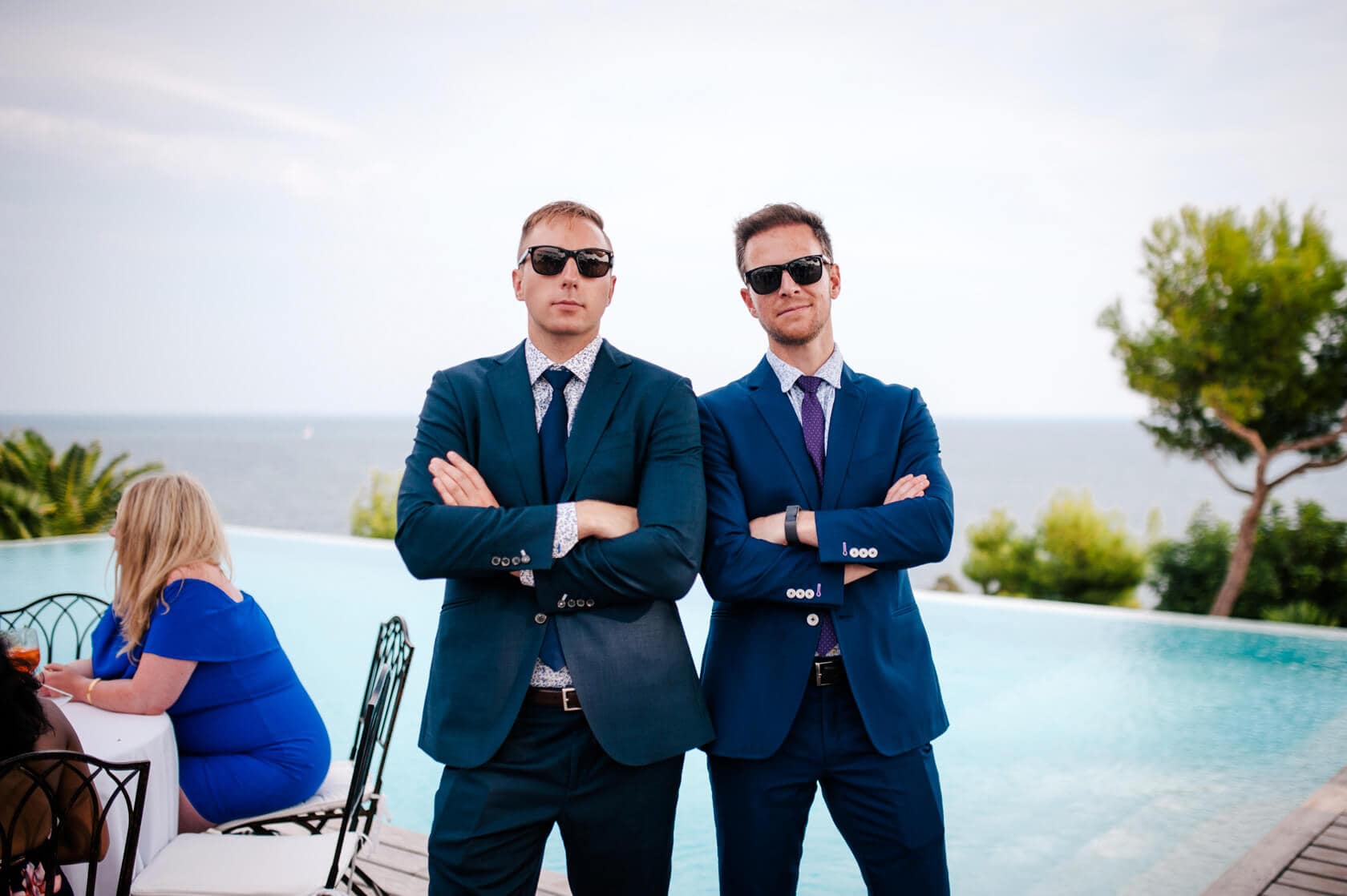 Hayley and Mark, a bride and groom, walk hand-in-hand at their wedding. - Barcelona Wedding Photographer