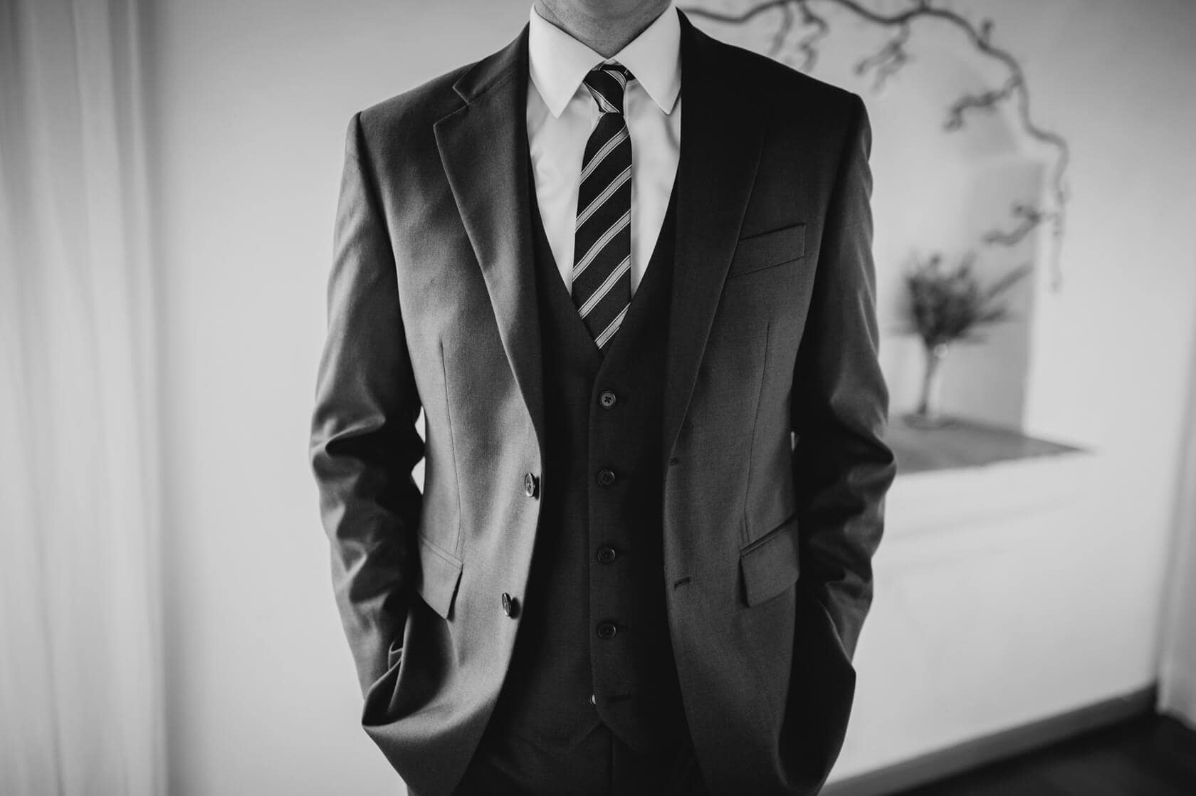 Hayley and Mark, a bride and groom, walk hand-in-hand at their wedding. - Barcelona Wedding Photographer