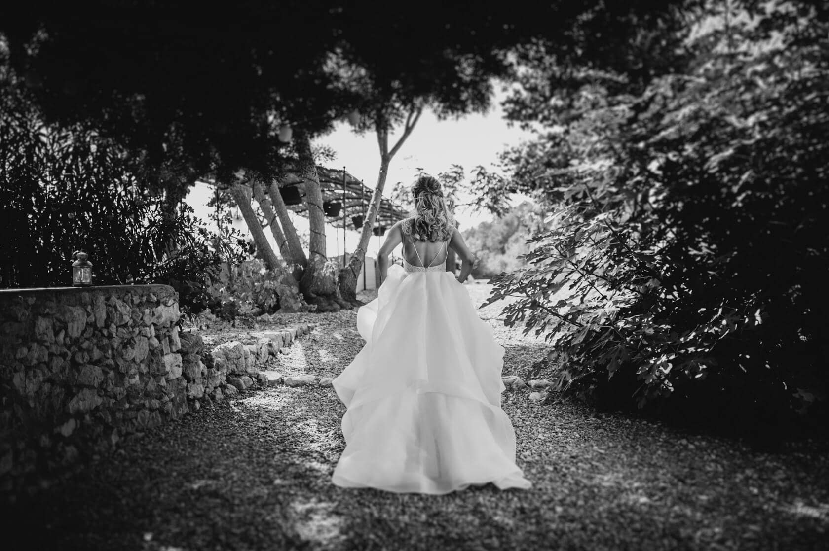 Bride walking down path at Torre del Veguer wedding - Barcelona Wedding Photographer