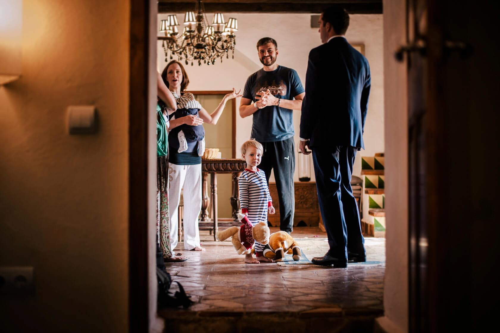 Hayley and Mark, a bride and groom, walk hand-in-hand at their wedding. - Barcelona Wedding Photographer