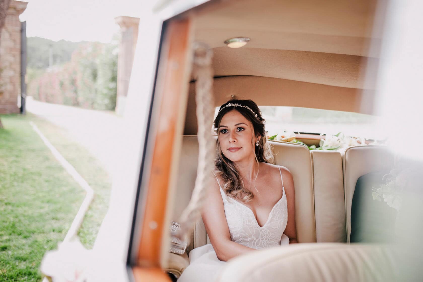 Hayley and Mark, a bride and groom, walk hand-in-hand at their wedding. - Barcelona Wedding Photographer