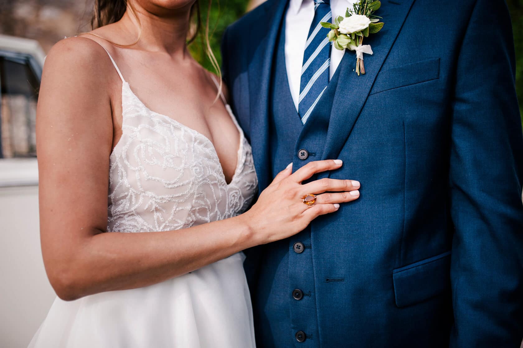 Hayley and Mark, a bride and groom, walk hand-in-hand at their wedding. - Barcelona Wedding Photographer