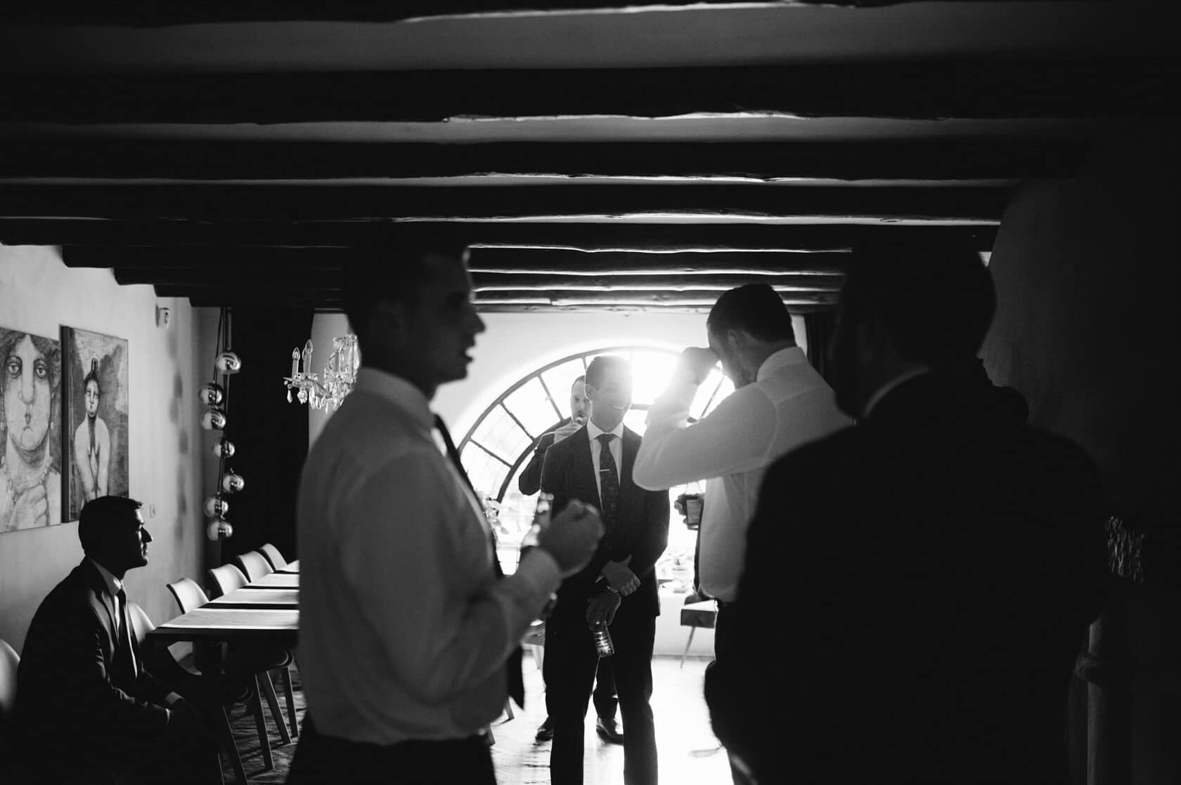 Hayley and Mark, a bride and groom, walk hand-in-hand at their wedding. - Barcelona Wedding Photographer