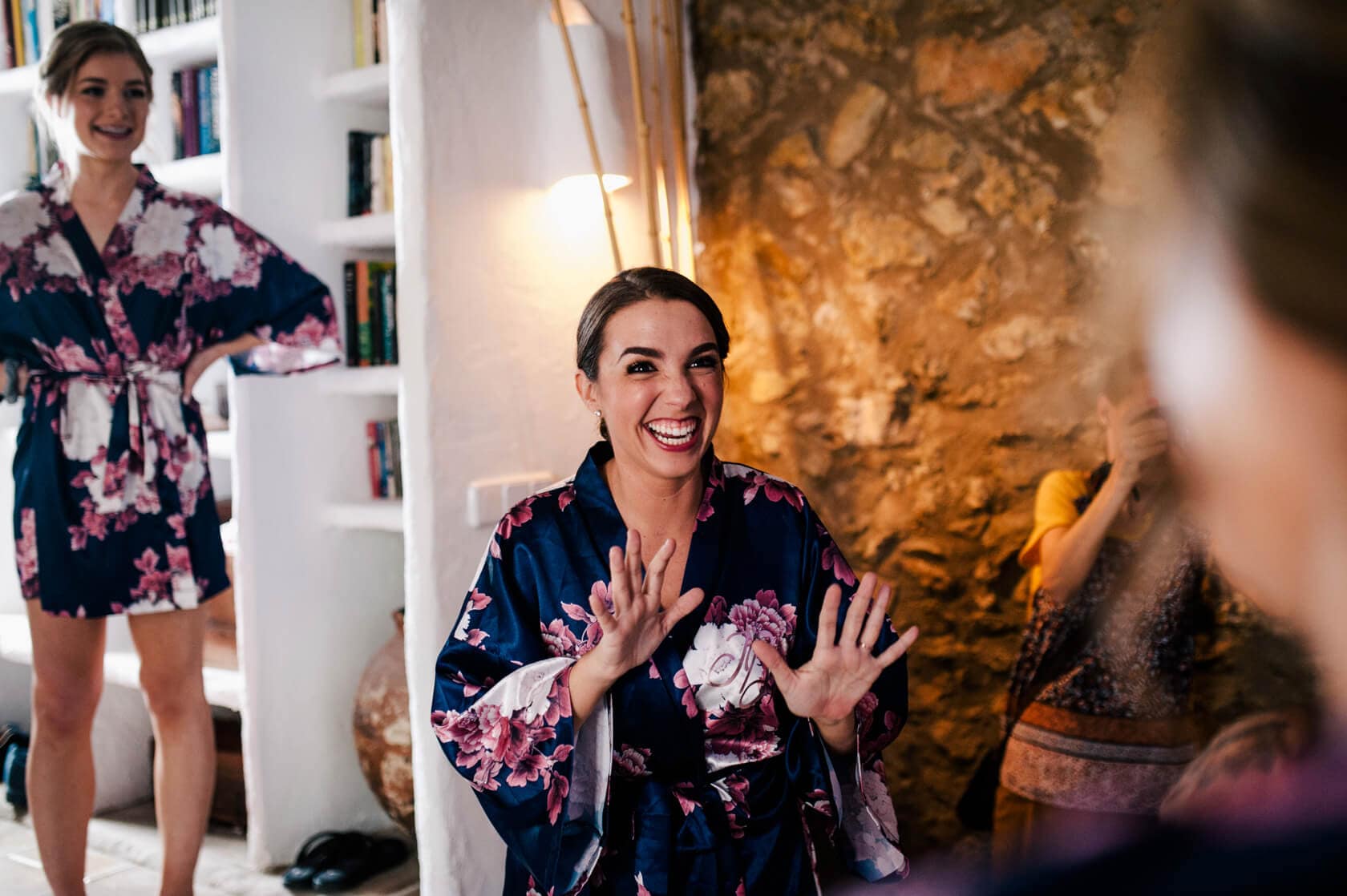 Hayley and Mark, a bride and groom, walk hand-in-hand at their wedding. - Barcelona Wedding Photographer