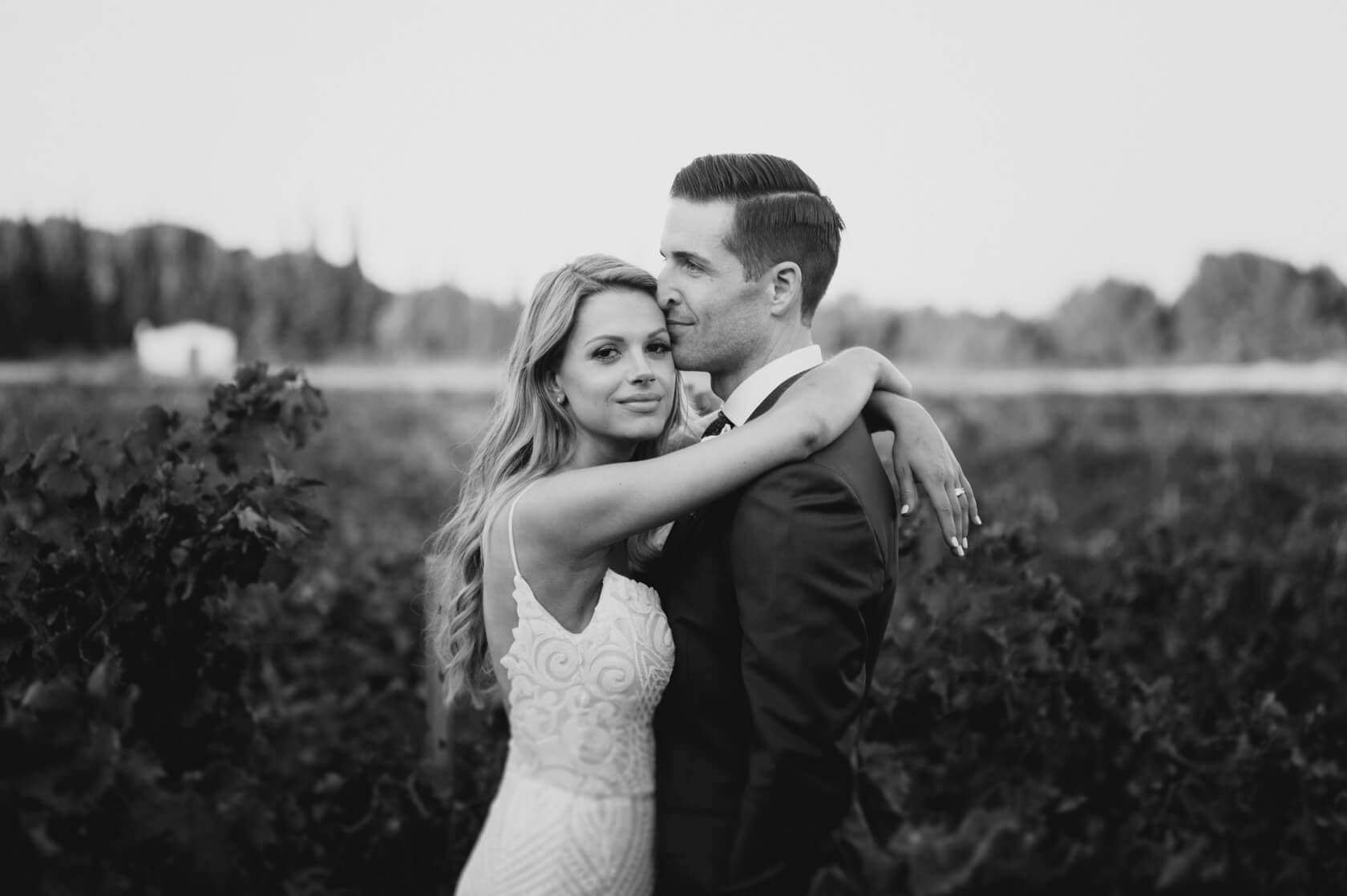 Hayley and Mark, a bride and groom, walk hand-in-hand at their wedding. - Barcelona Wedding Photographer