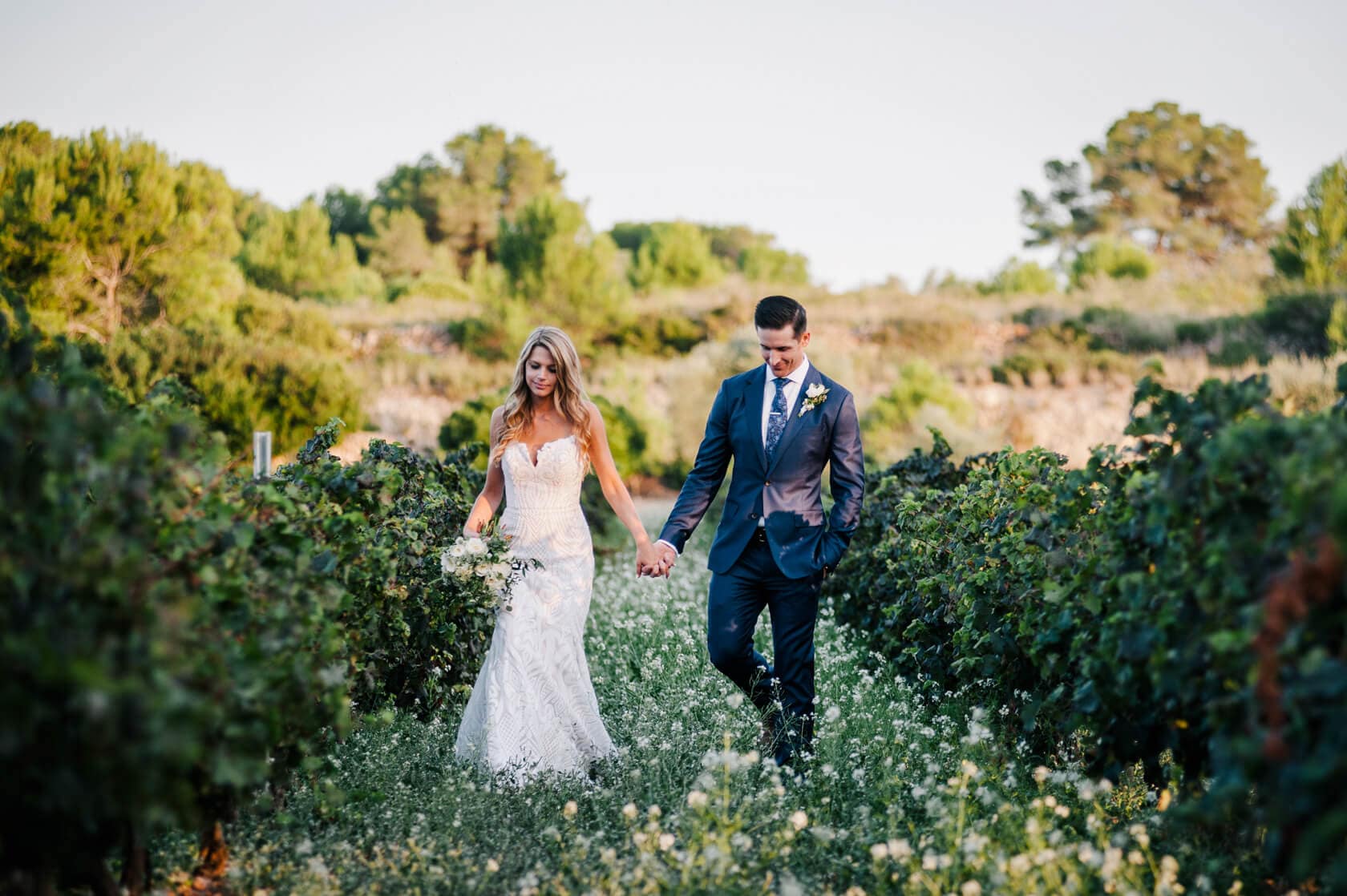 Melissa & Christopher in the vineyard at their Clos la Plana wedding. - Barcelona Wedding Photographer
