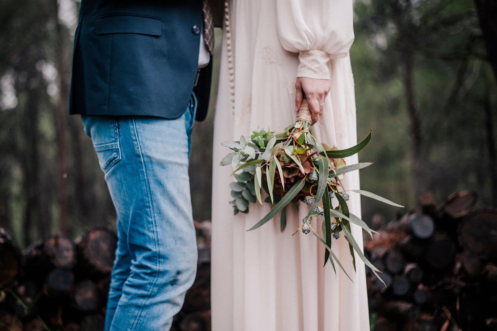 Hayley and Mark, a bride and groom, walk hand-in-hand at their wedding. - Barcelona Wedding Photographer