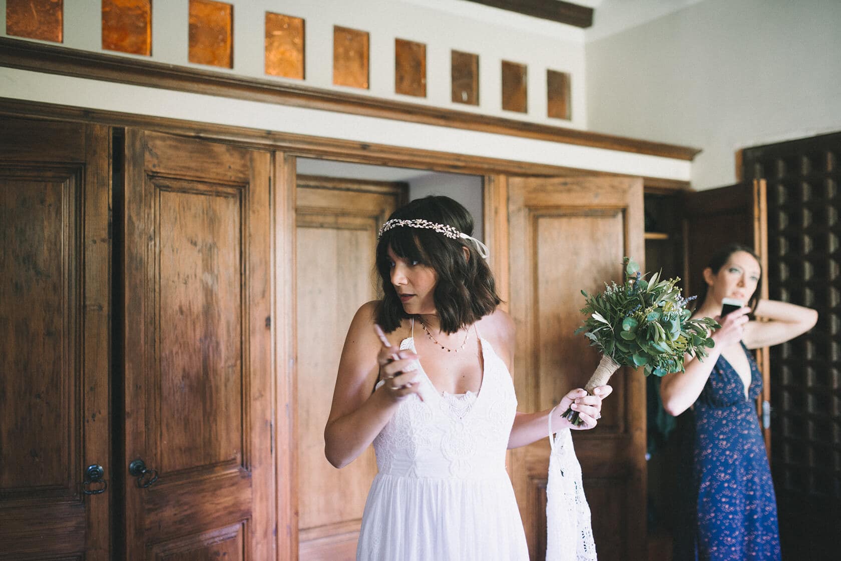 Bride in white dress with bouquet at Villa Almanita, Sitges destination wedding - Barcelona Wedding Photographer