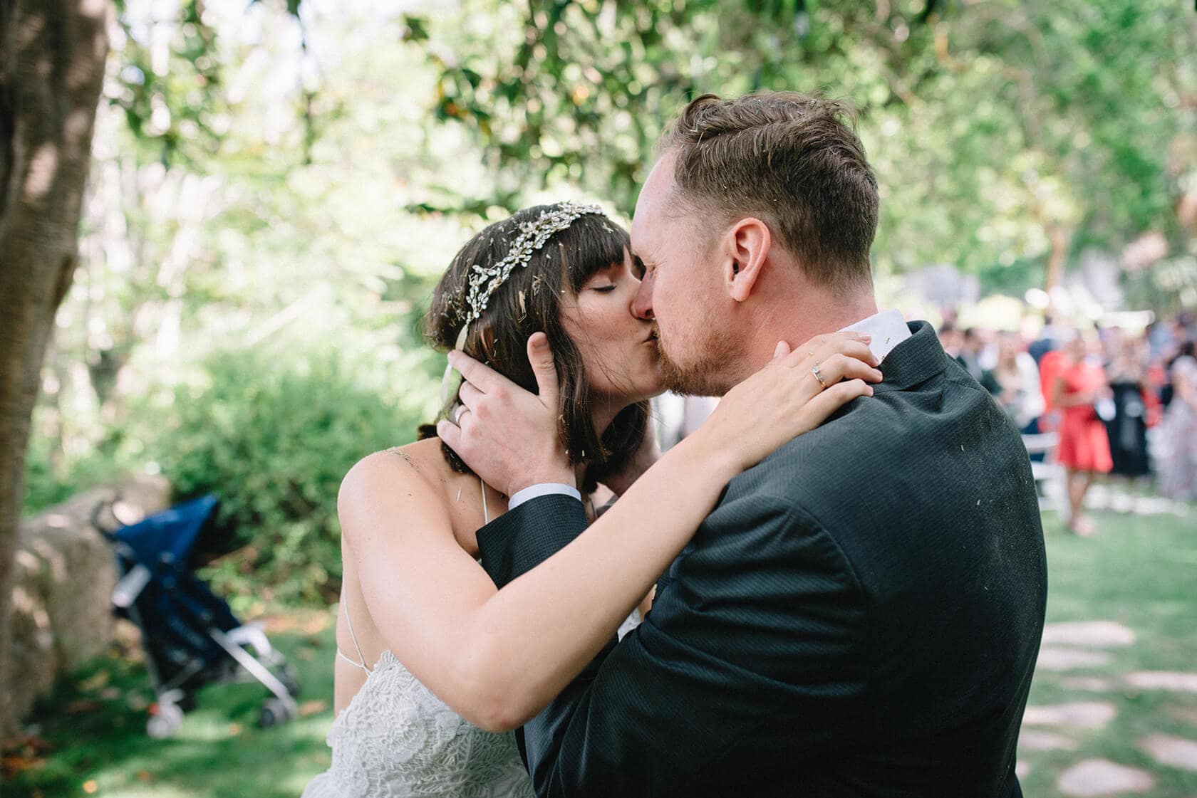 Clara and Toph kiss at their destination wedding at Villa Almanita in Sitges. - Barcelona Wedding Photographer