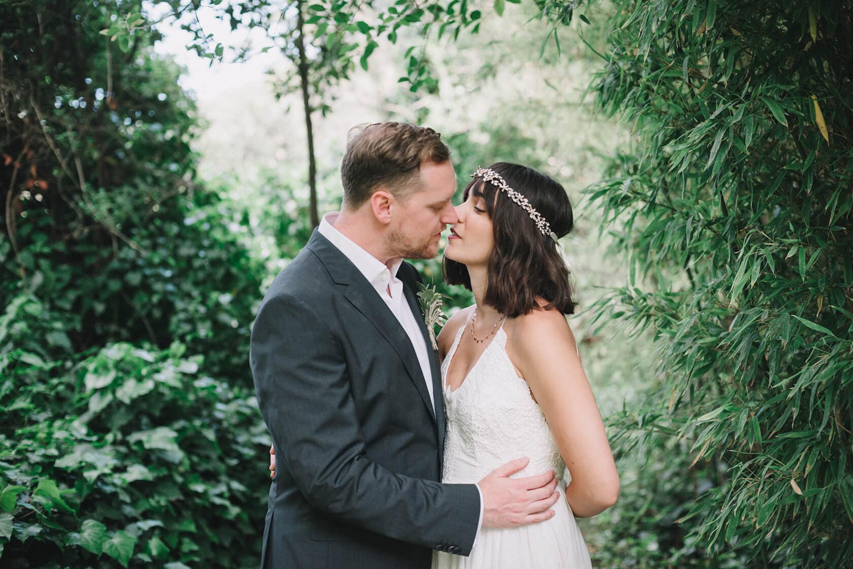 Bride and groom kissing at Villa Almanita, Sitges destination wedding - Barcelona Wedding Photographer
