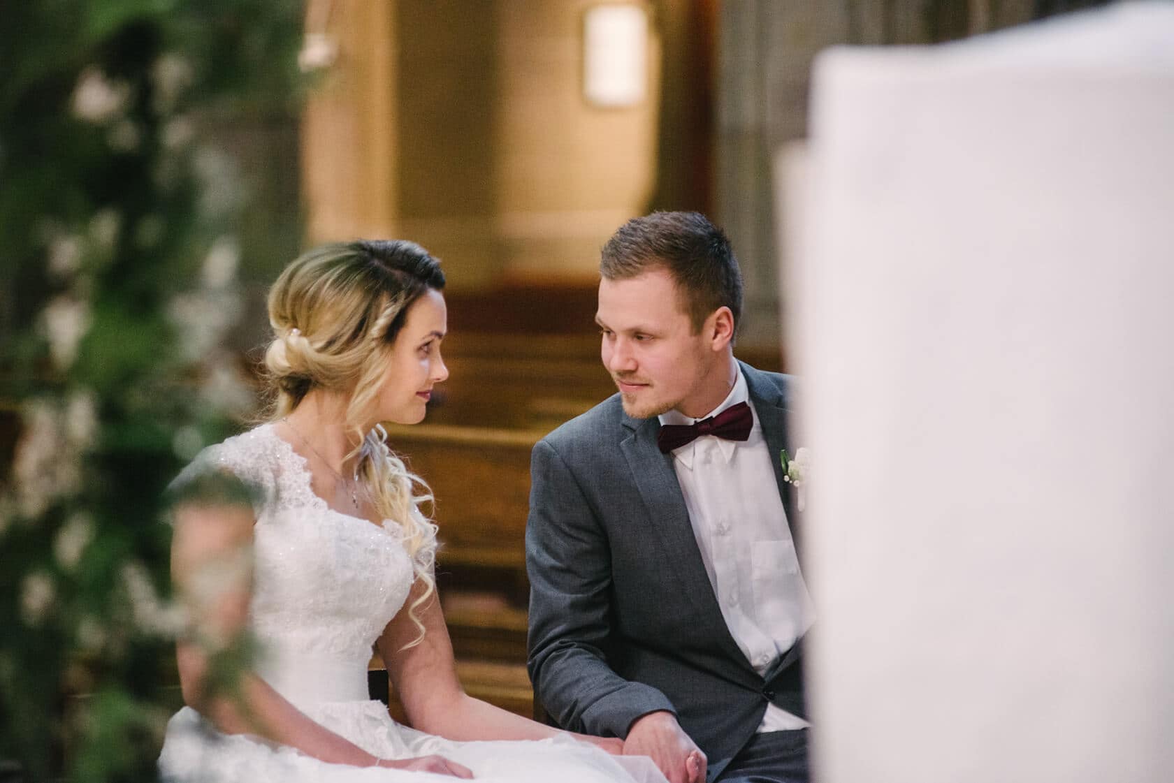 Bride and groom looking at each other in church, Barcelona wedding photographer - Barcelona Wedding Photographer