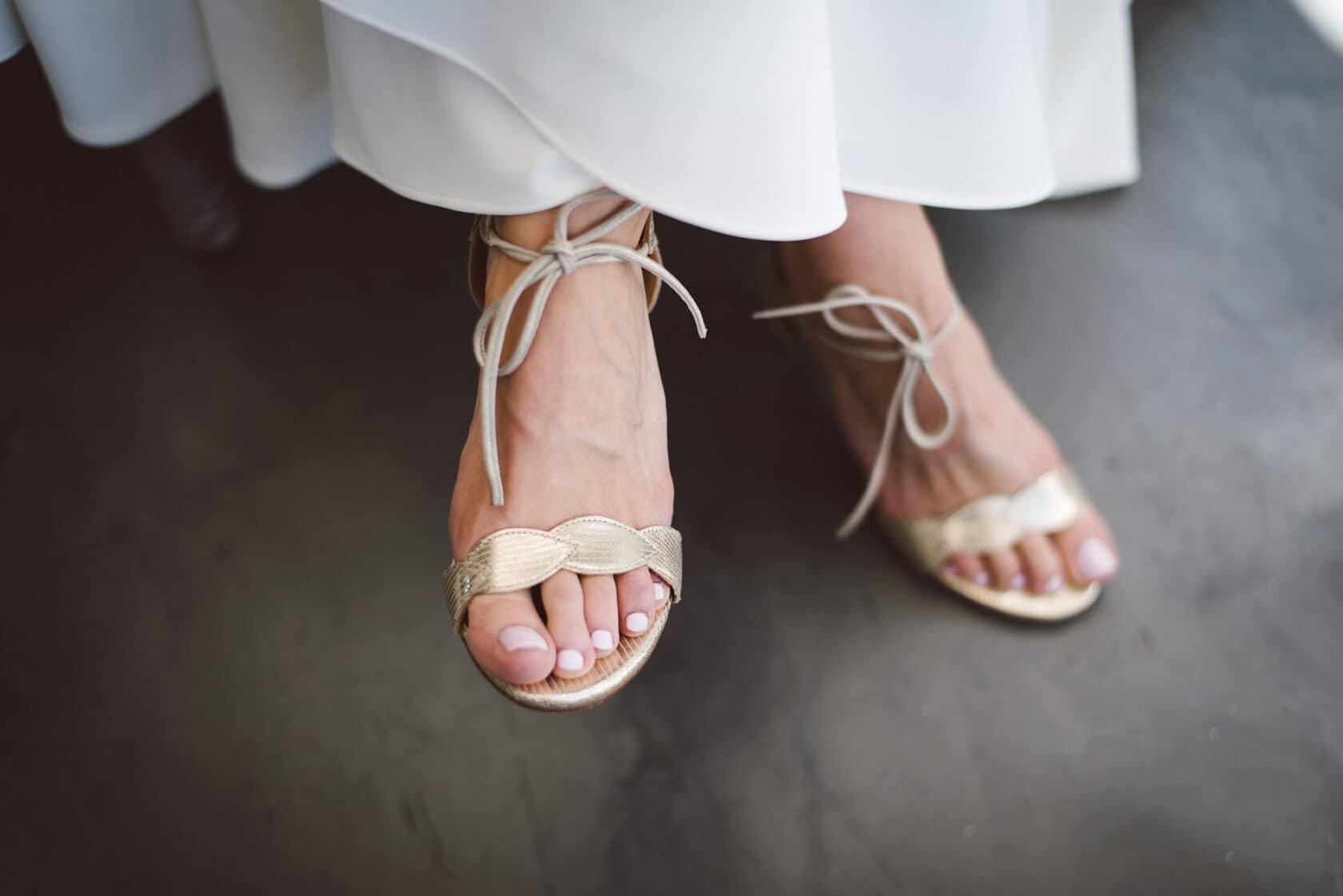 Bride's gold strappy sandals at Casanova Estate wedding venue - Barcelona Wedding Photographer