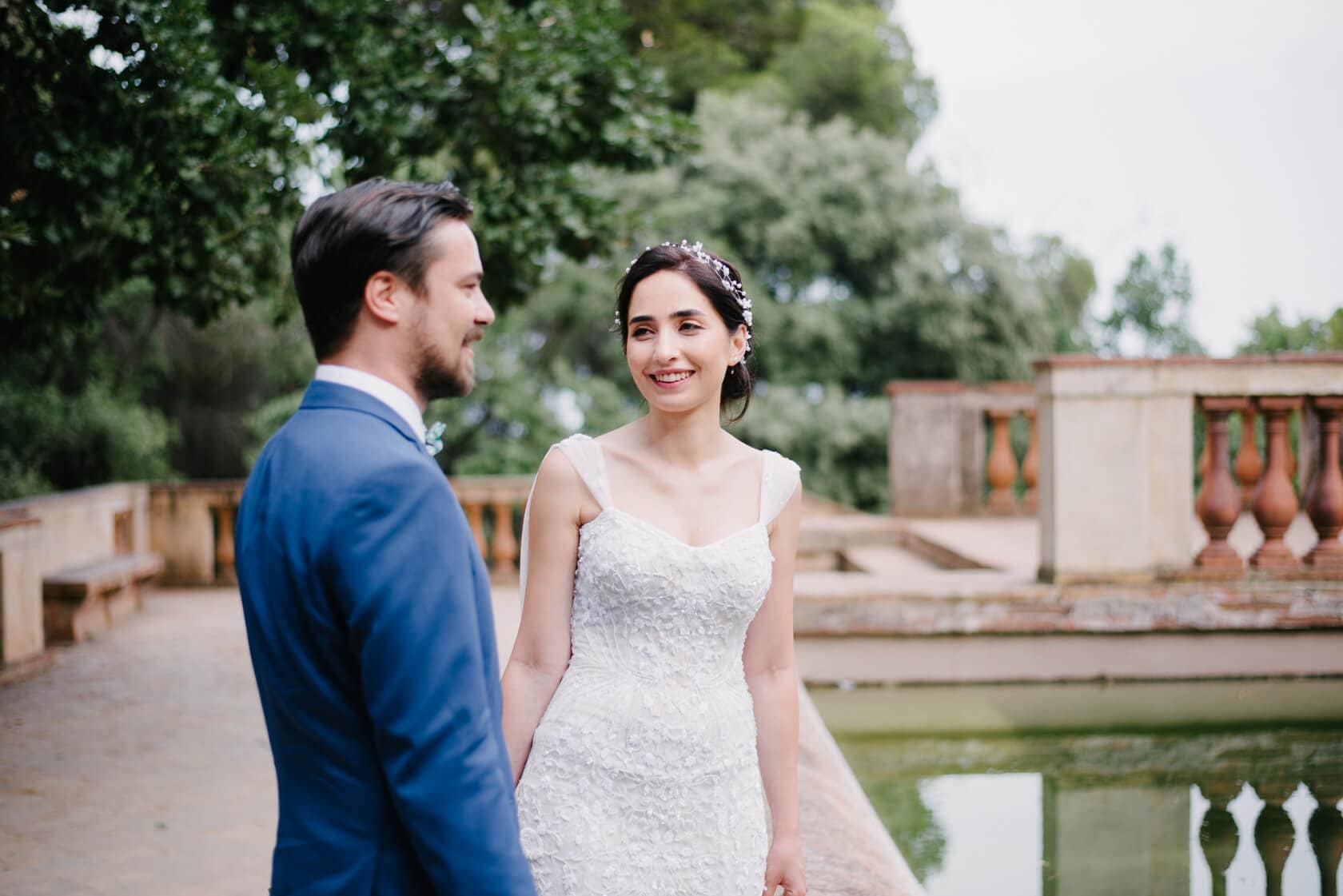 Bride and groom holding hands at Parc del Laberint d'Horta wedding - Barcelona Wedding Photographer