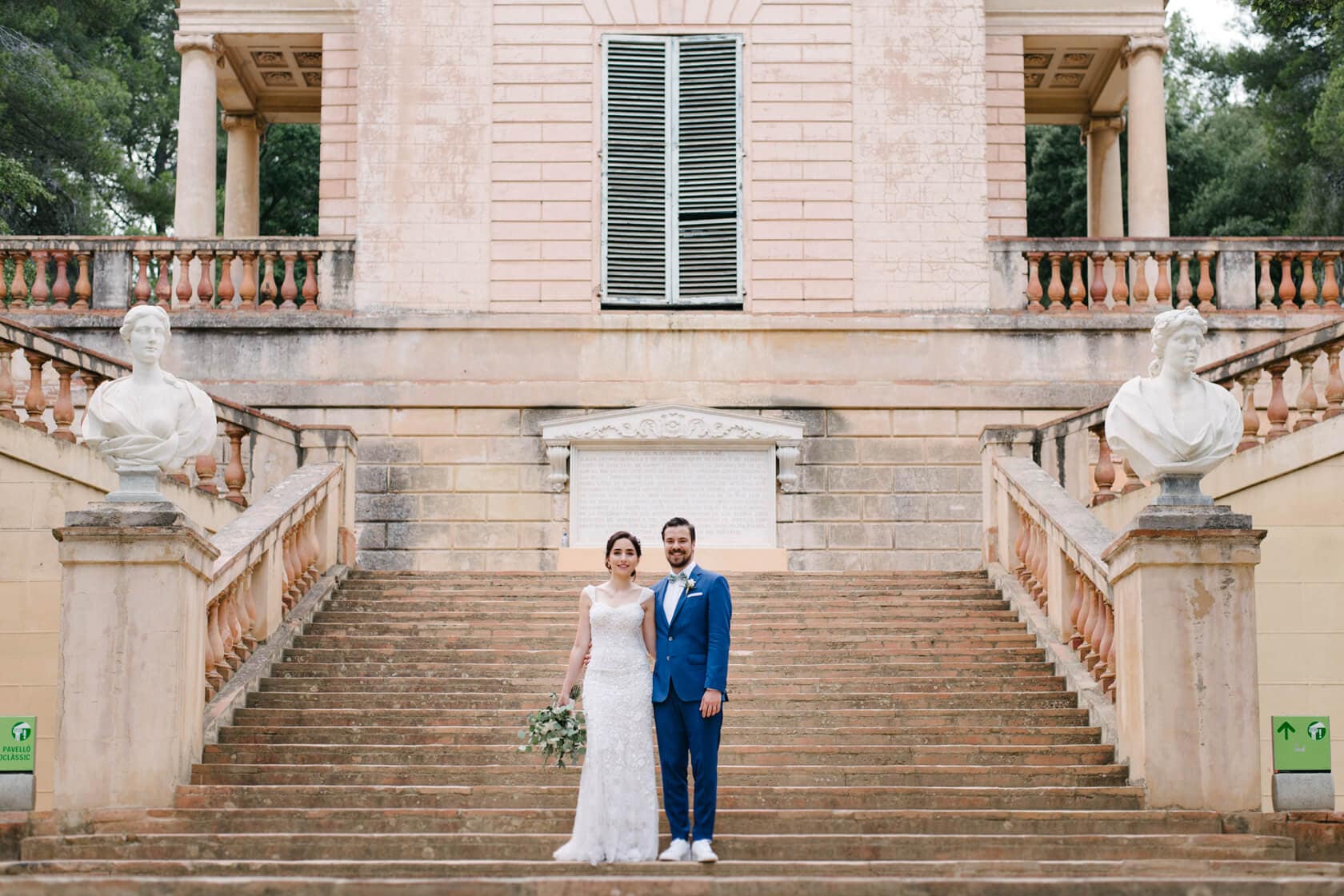 Wedding at Parc del Laberint d'Horta: Bride and groom on grand staircase - Barcelona Wedding Photographer