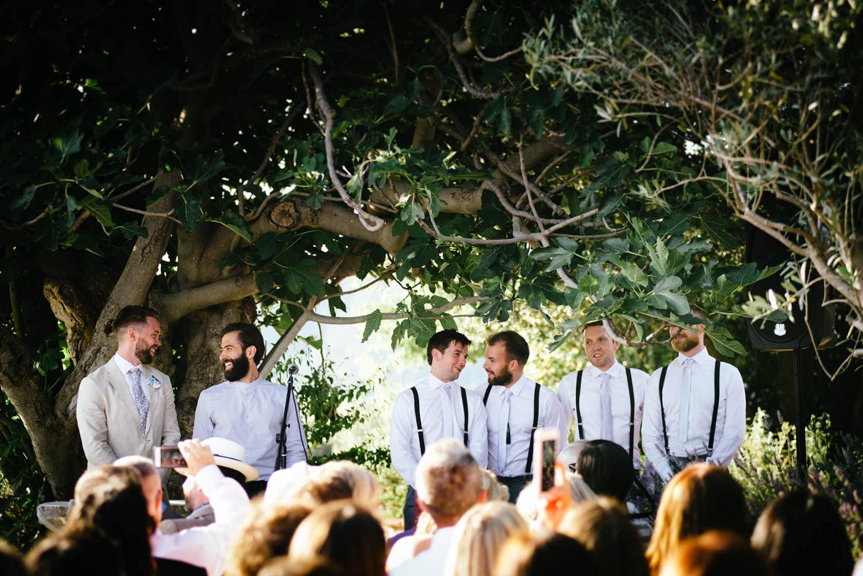 Groom and groomsmen in vintage style wedding attire. - Barcelona Wedding Photographer