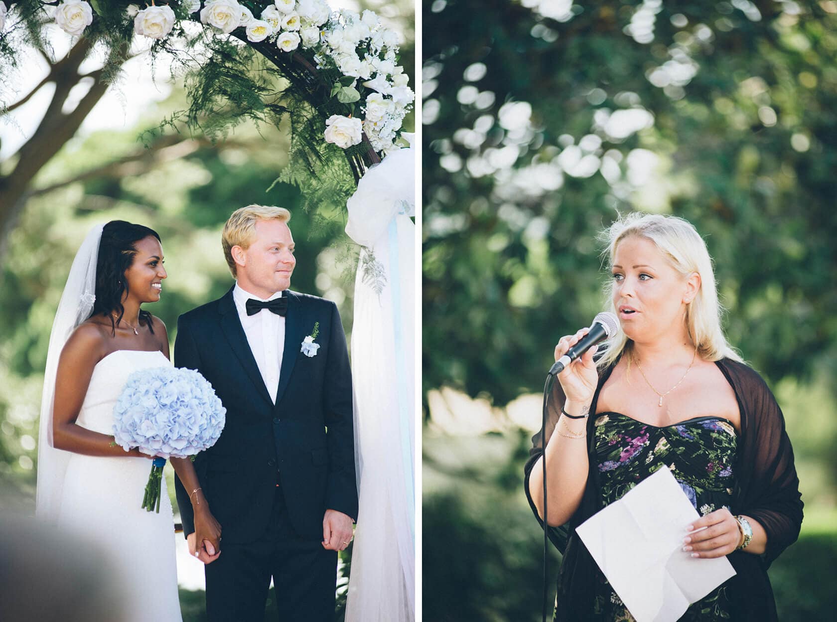 Wedding Photographer S'Agaro Spain: Bride and groom under floral arch, woman speaking. - Barcelona Wedding Photographer