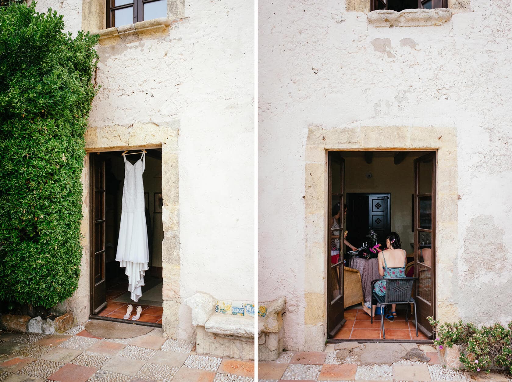 Wedding dress hangs outside Castell de Tamarit, bride prepares inside. - Barcelona Wedding Photographer