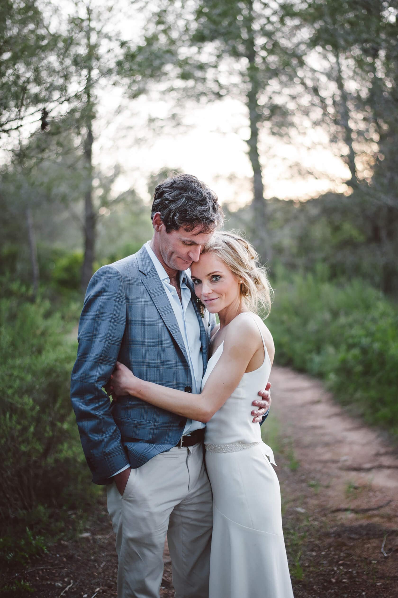 Catherine and James embrace at their Casanova Estate wedding venue. - Barcelona Wedding Photographer